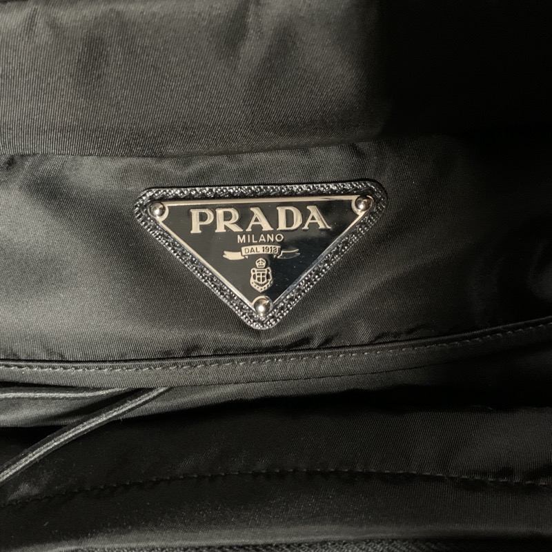 PRADA（プラダ）のバックパック リュックサック Re-Nylon×サフィアーノレザー 2VZ090 2DMG F0002